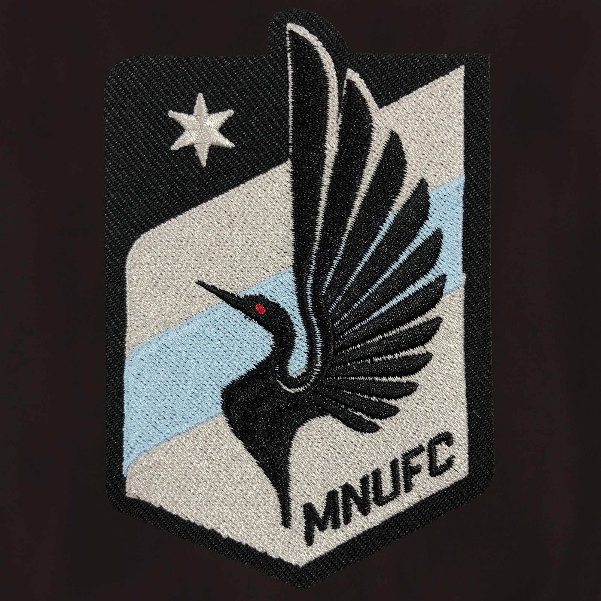 JH Design Minnesota United FC Black Bomber Jacket