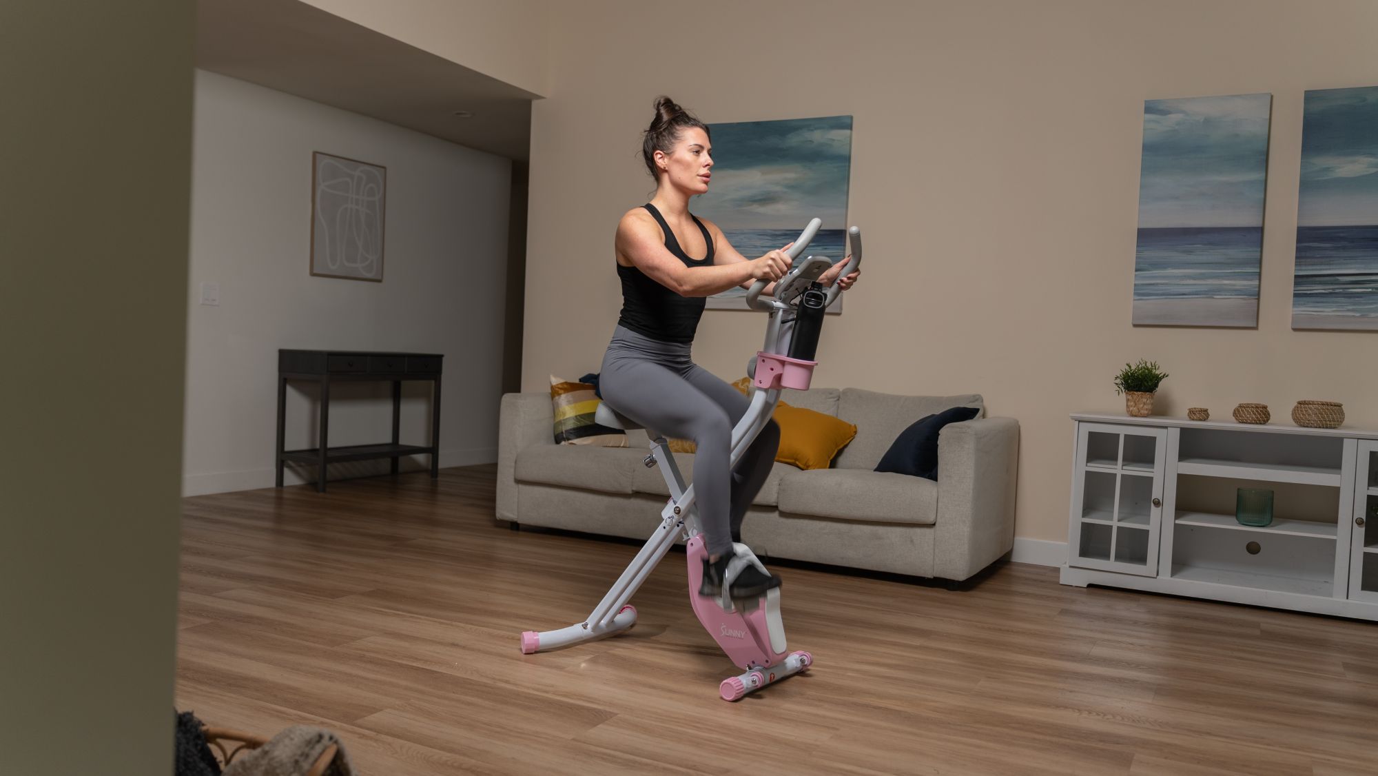 Sunny Health & Fitness Pink Foldable Magnetic Exercise X-Bike product image