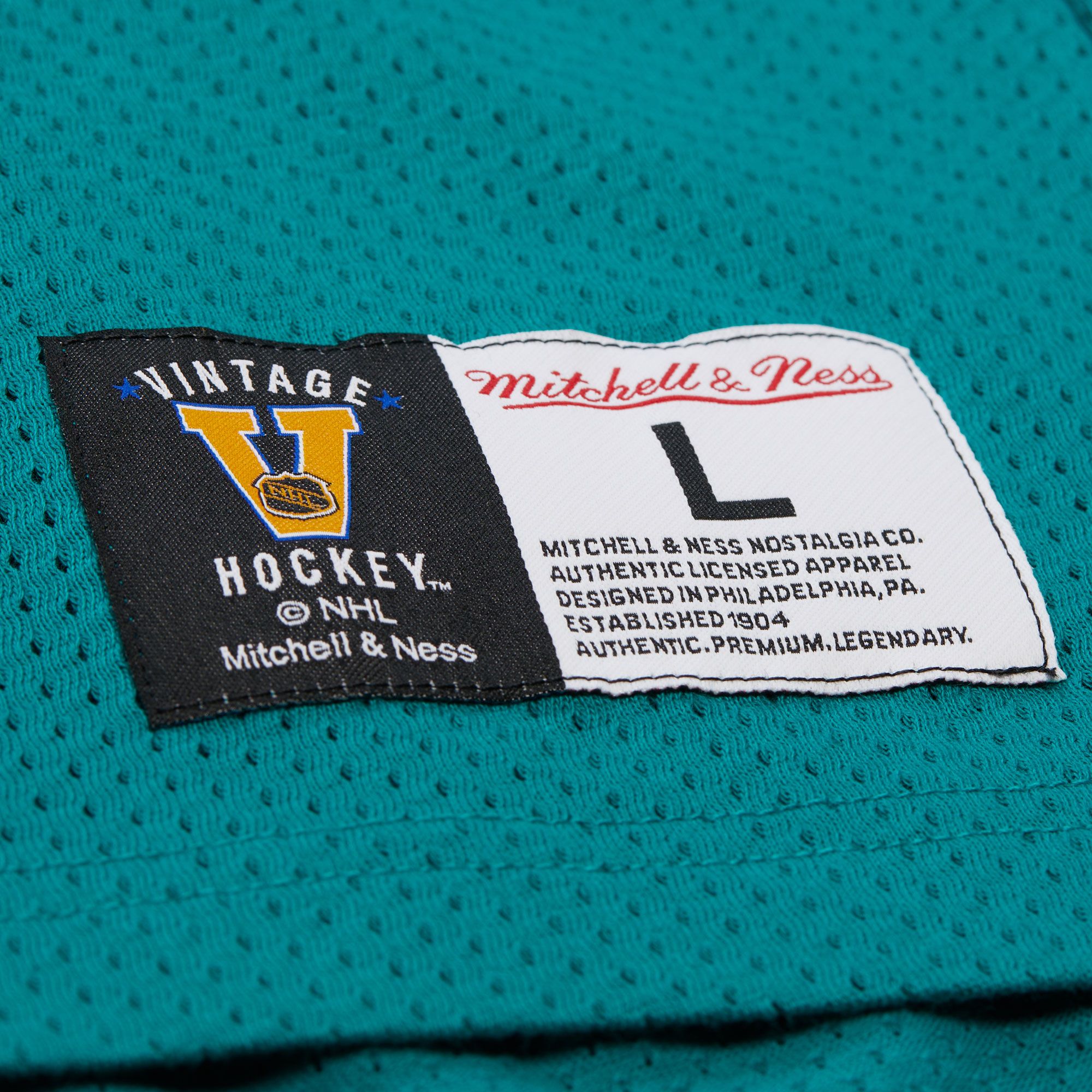 Mitchell & Ness Men's Anaheim Ducks Teal Playmaker Mesh T-Shirt product image