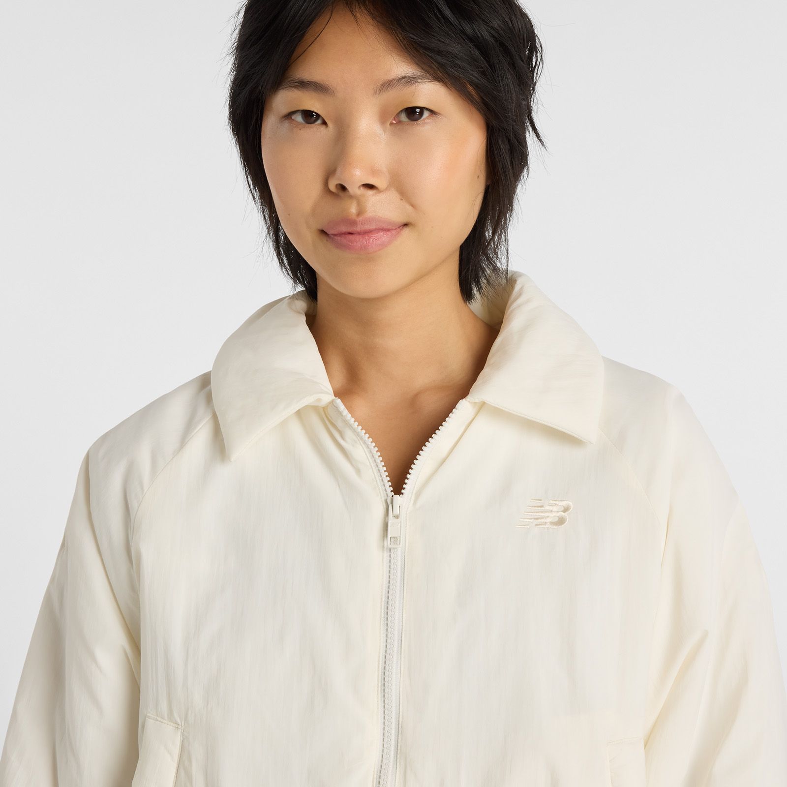 New Balance Women's Woven Bomber Jacket product image