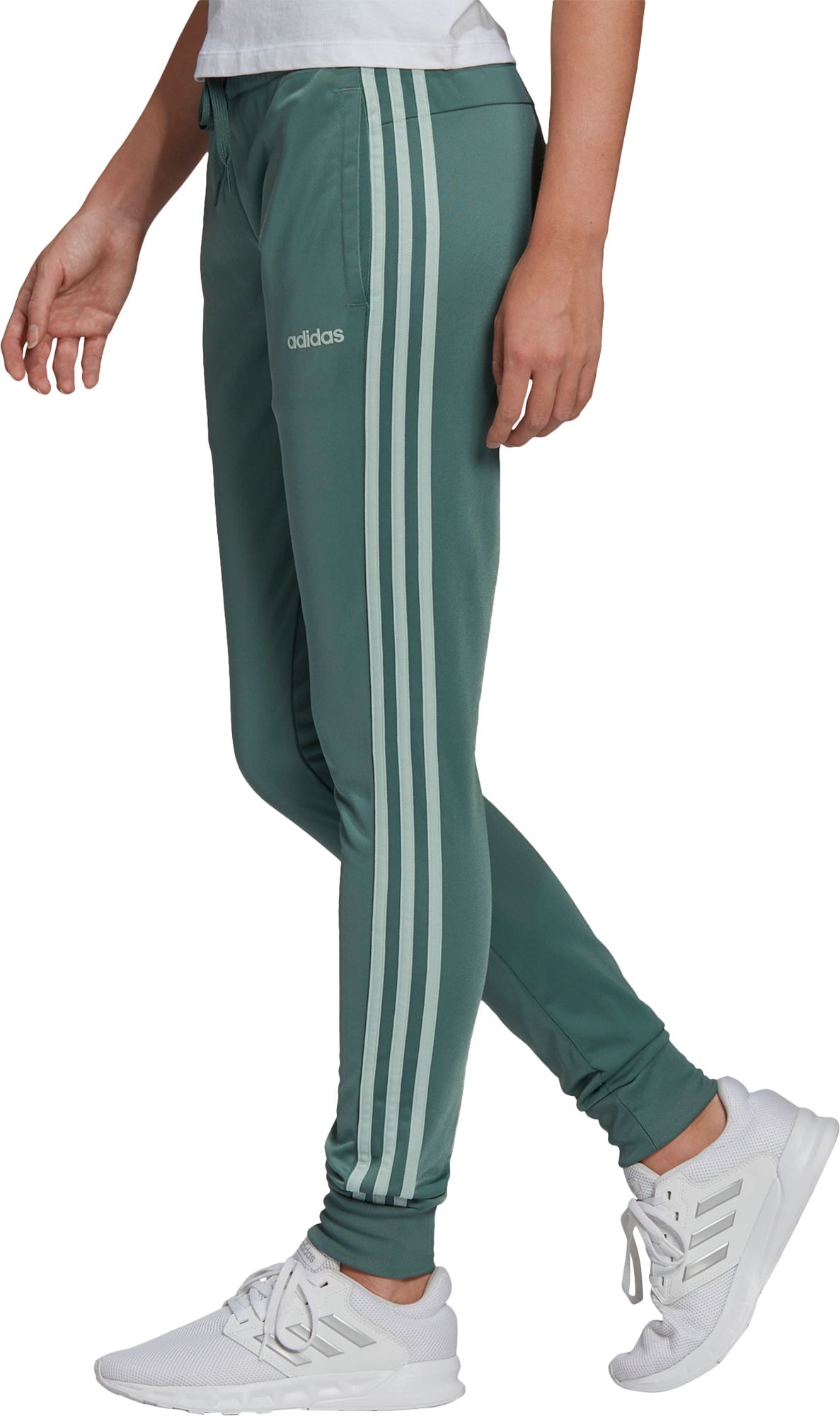 green adidas track pants