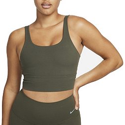 Nike Training Swoosh Dri-FIT leopard print medium support sports bra in  black - ShopStyle