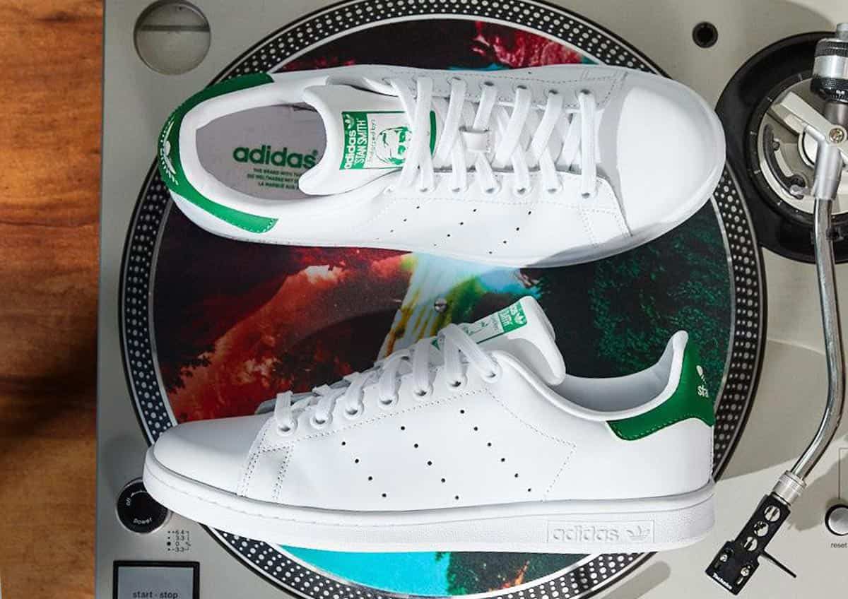 Classic adidas Stan Smith green and white tennis shoes.