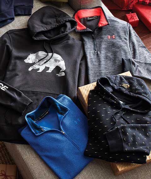 A North Face Men's Bearinda Pullover Hoodie, Nike Men's Sportswear Swoosh Pullover Hoodie, Under Armour Men's Armour Fleece ½ Zip Long Sleeve Shirt, and an Under Armour Men's Sweaterfleece Golf ½ Zip.