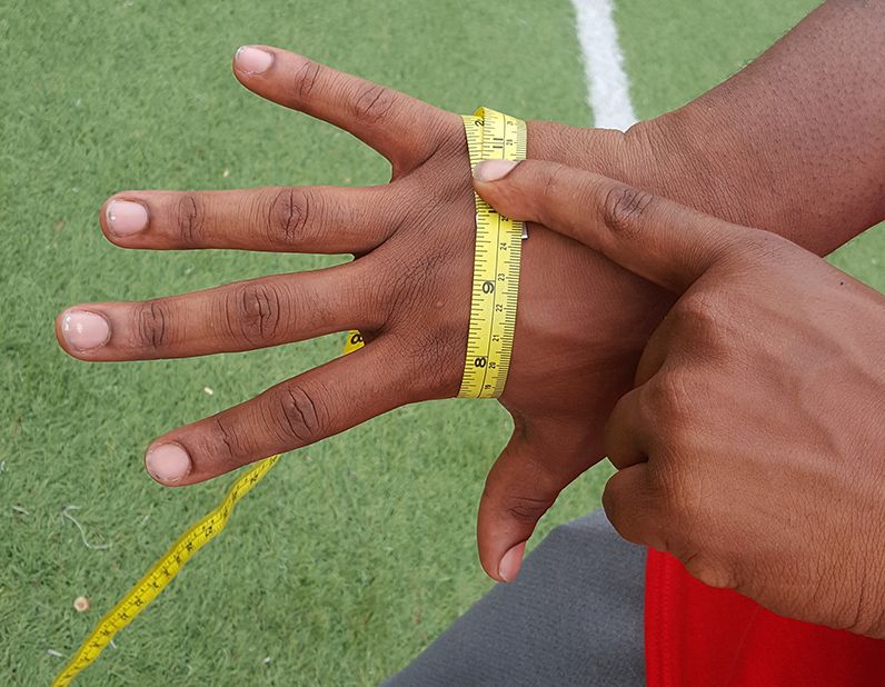 How to measure hand sales size for football gloves